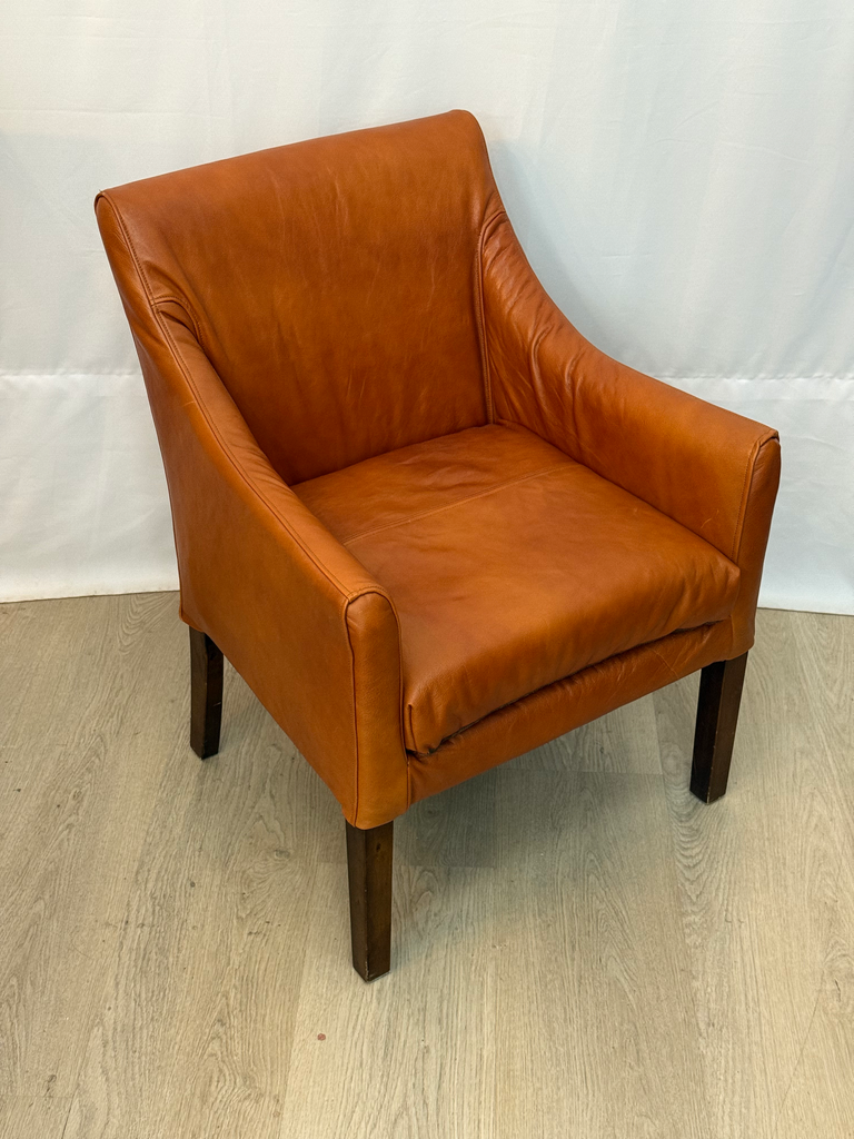 Butaca tapissada de cuir natural